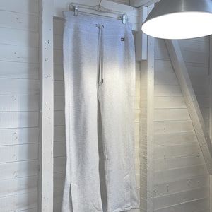 Tommy Hilfiger, women’s light gray drawstring sweatpants with slit at the leg